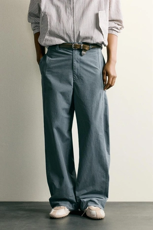 Брюки Relaxed Fit с эффектом потертости и хлястиками- Заказать в России