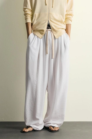 Брюки Relaxed Fit из струящейся ткани- Заказать в России