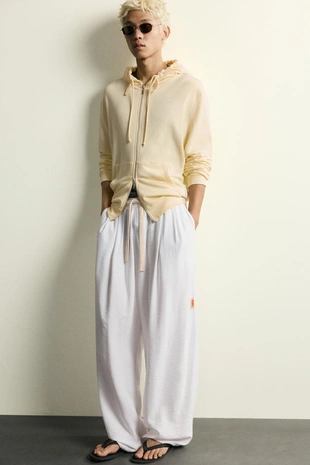 Брюки Relaxed Fit из струящейся ткани- Заказать в России