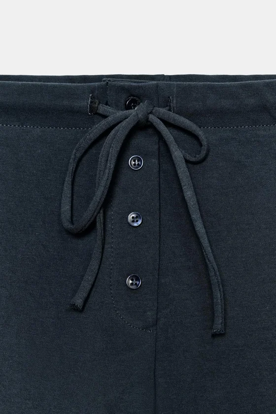 БРЮКИ CARROT FIT ИЗ ТРИКОТАЖА ИНТЕРЛОК