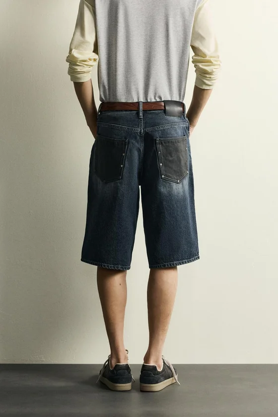 ДЖИНСОВЫЕ ШОРТЫ BAGGY FIT СО ВСТАВКАМИ ИЗ КОЖИ