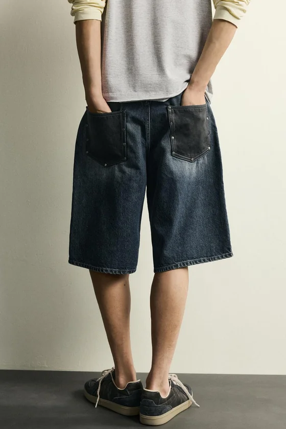 ДЖИНСОВЫЕ ШОРТЫ BAGGY FIT СО ВСТАВКАМИ ИЗ КОЖИ