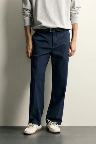 Брюки Relaxed Fit с эффектом потертости- Заказать в России