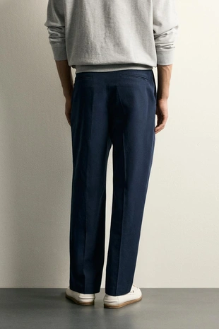 Брюки Relaxed Fit с эффектом потертости- Заказать в России