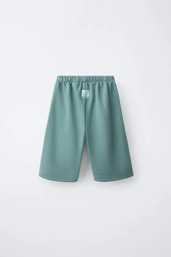 БРЮКИ WIDE LEG ИЗ МЯГКОЙ ТКАНИ С НАШИВКОЙ
