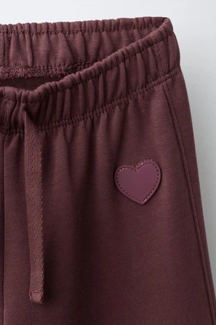 Брюки Wide Leg из мягкой ткани с декором в виде сердца- Заказать в России