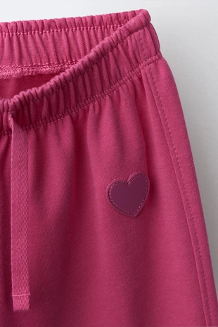 Брюки Wide Leg из мягкой ткани с сердцем- Заказать в России