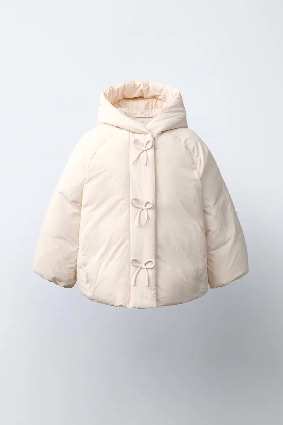 СТЕГАНОЕ ПАЛЬТО WATER REPELLENT С БАНТИКАМИ