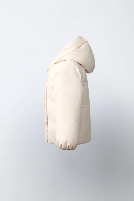 СТЕГАНОЕ ПАЛЬТО WATER REPELLENT С БАНТИКАМИ