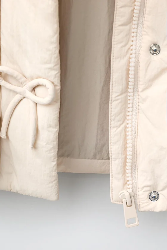 СТЕГАНОЕ ПАЛЬТО WATER REPELLENT С БАНТИКАМИ