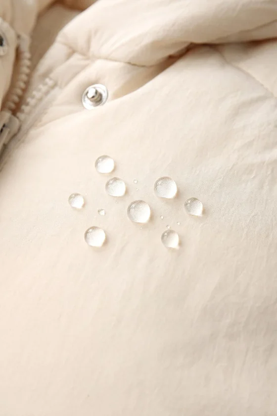 СТЕГАНОЕ ПАЛЬТО WATER REPELLENT С БАНТИКАМИ