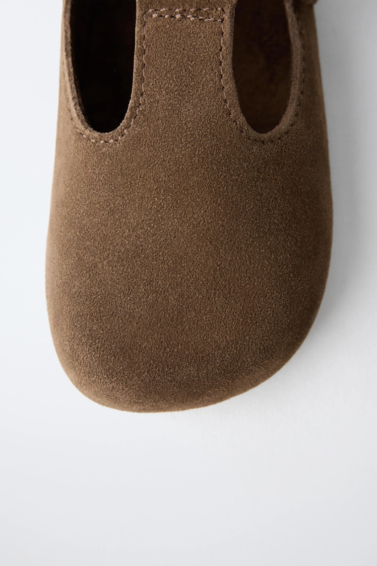 Кожаные сабо с ремешком t-образной формы
