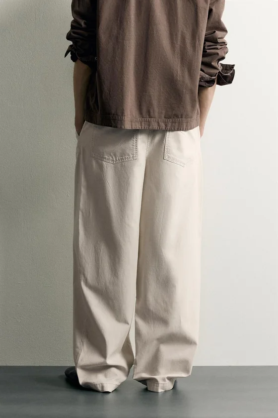 БРЮКИ RELAXED FIT СО СКЛАДКАМИ И РЕМНЕМ