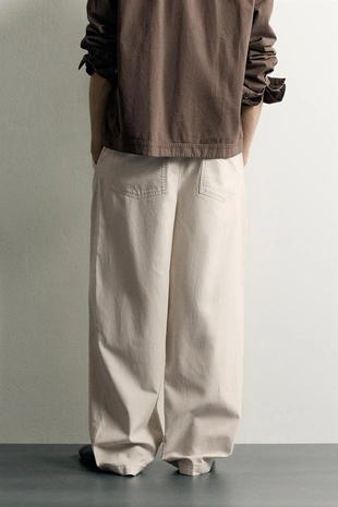 Брюки Relaxed Fit со складками и ремнем