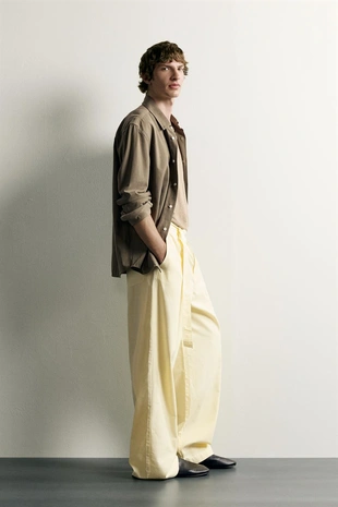 Брюки Relaxed Fit со складками и ремнем