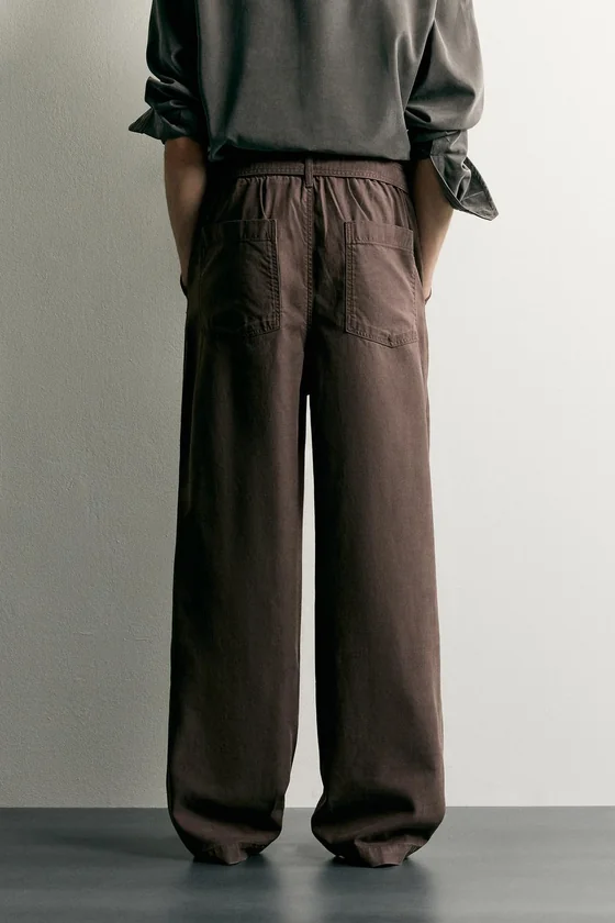 БРЮКИ RELAXED FIT СО СКЛАДКАМИ И РЕМНЕМ