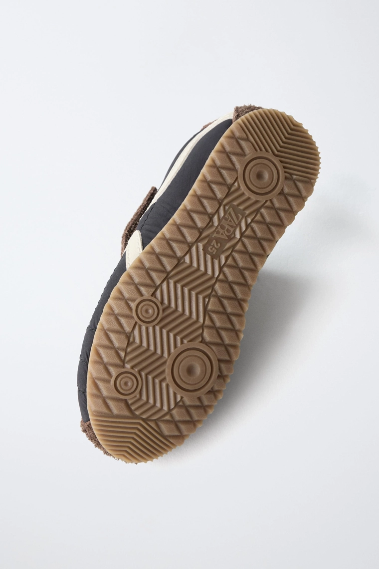Дизайнерские комбинированные кроссовки