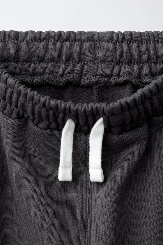 БРЮКИ-ДЖОГГЕРЫ ИЗ МЯГКОЙ ТКАНИ PSG ®