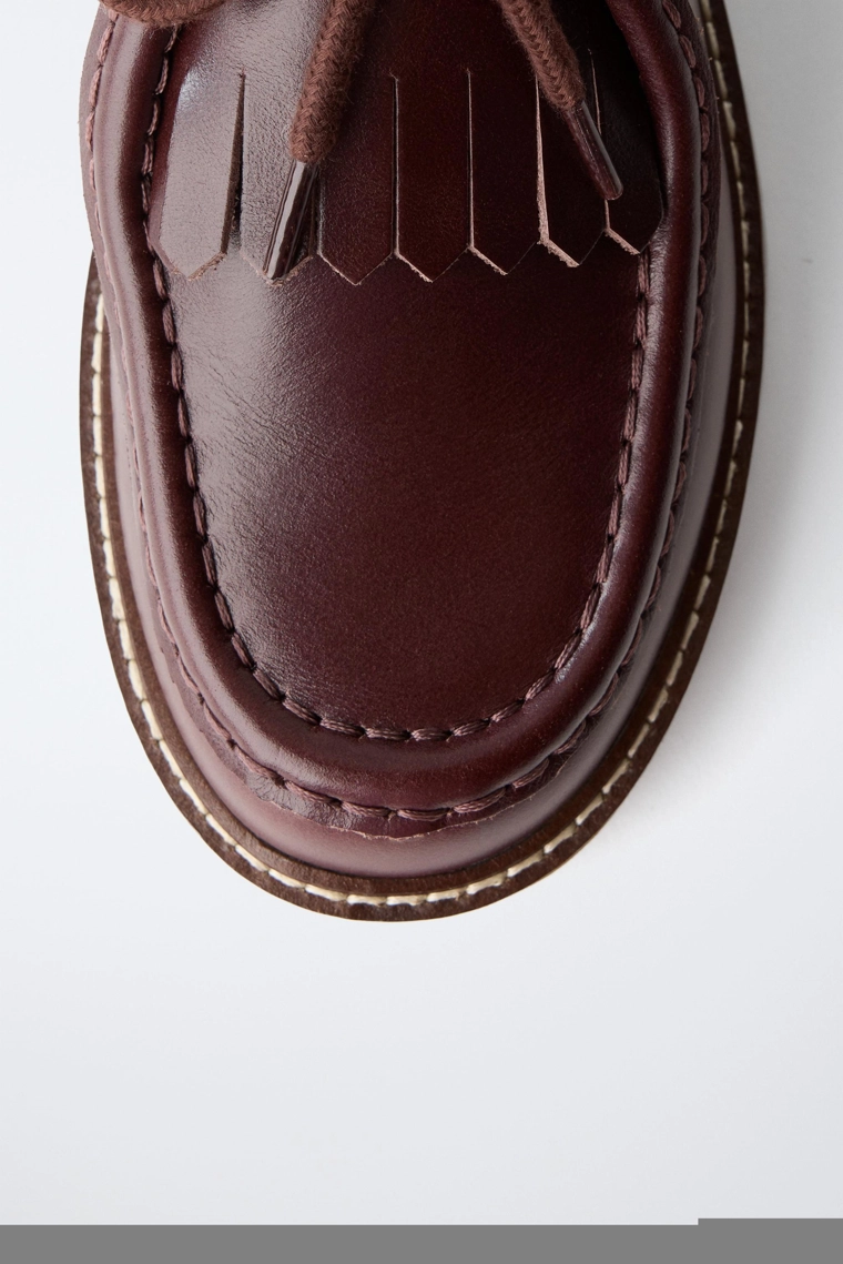 Кожаные туфли wallabee с бахромой