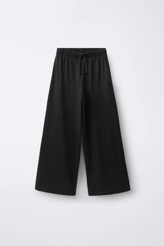 БРЮКИ WIDE LEG С ЭФФЕКТОМ ПОТЕРТОСТИ И ПРИНТОМ ЗВЕЗД