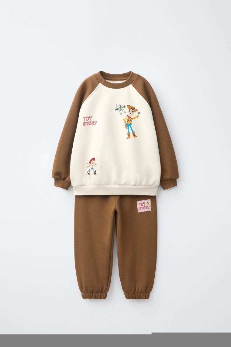Комплект toy story © disney pixar: свитшот и джоггеры