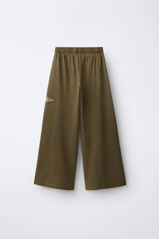 БРЮКИ WIDE LEG С ЭФФЕКТОМ ПОТЕРТОСТИ И ПРИНТОМ ЗВЕЗД