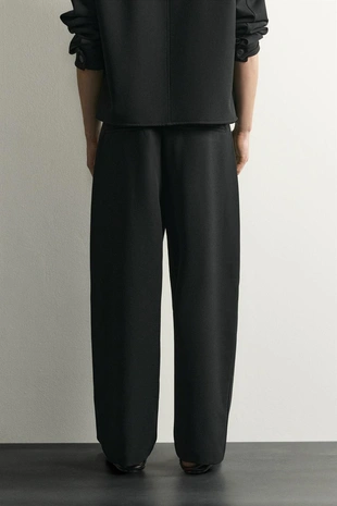 Брюки Relaxed Fit со складками- Заказать в России