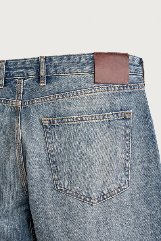 ДЖИНСЫ BOOTCUT С НИЗКОЙ ПОСАДКОЙ И РАЗРЕЗАМИ