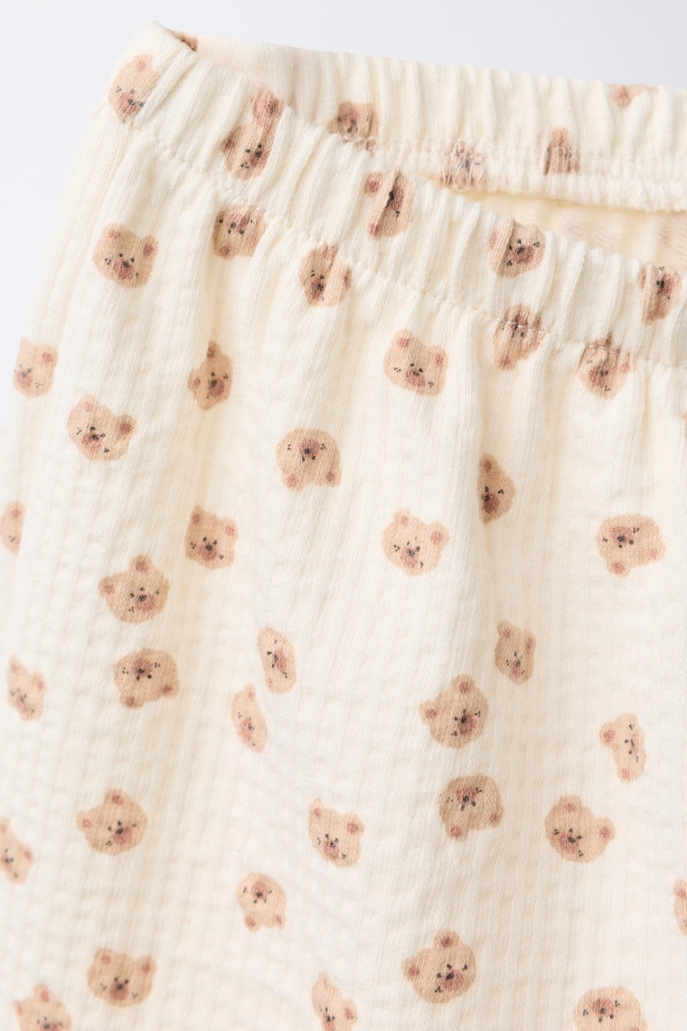 Брюки с текстурным принтом медведя