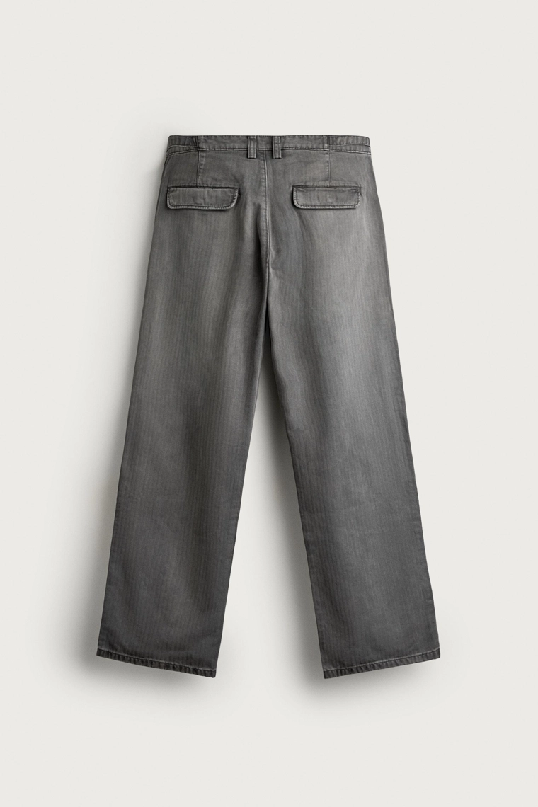 Брюки с узором ёлочка и боковыми застёжками