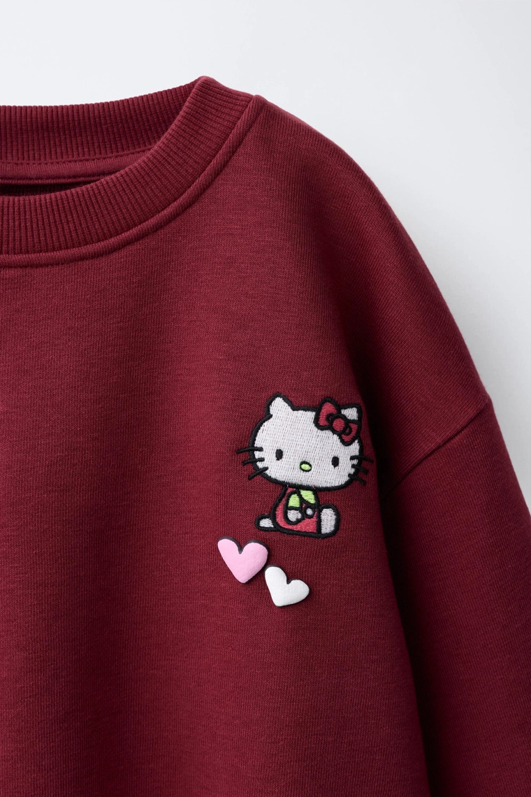 Костюм с толстовкой hello kitty © sanrio и расклешёнными леггинсами