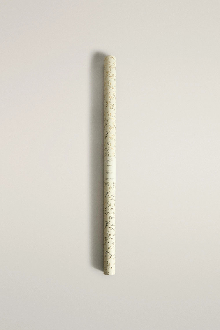 Упаковочная бумага с рождественским принтом листьев