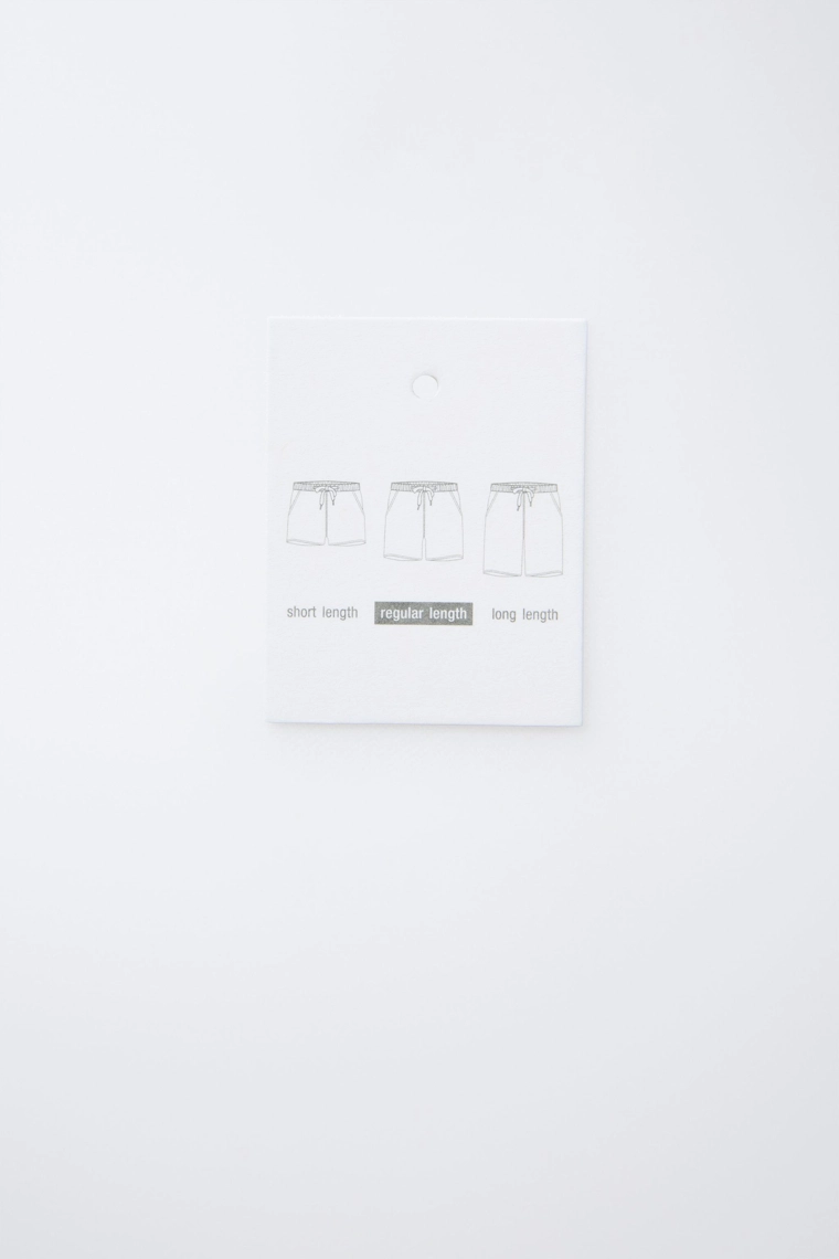 Шорты-бермуды для плавания 6-14 лет с ярлыком