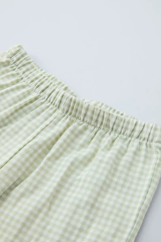 ДЕТСКАЯ ПИЖАМА В КЛЕТЧАТУЮ ПОЛОСКУ