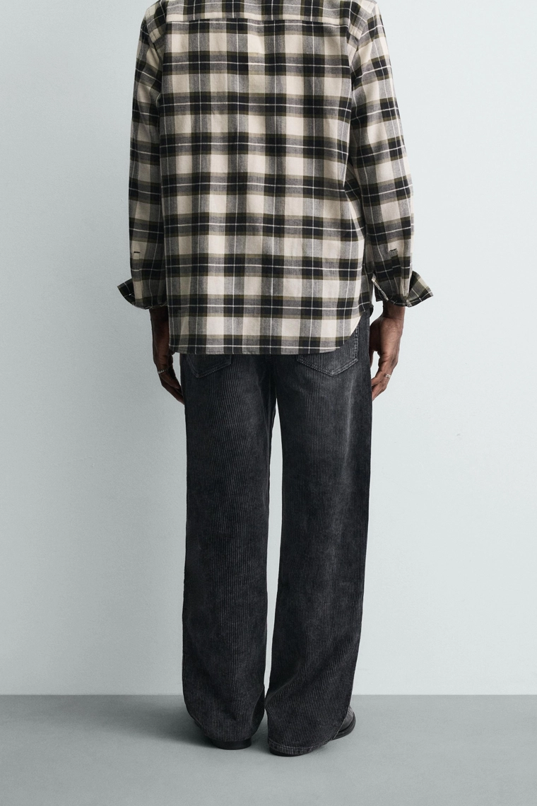 Широкие брюки из вельвета с перекрученными швами