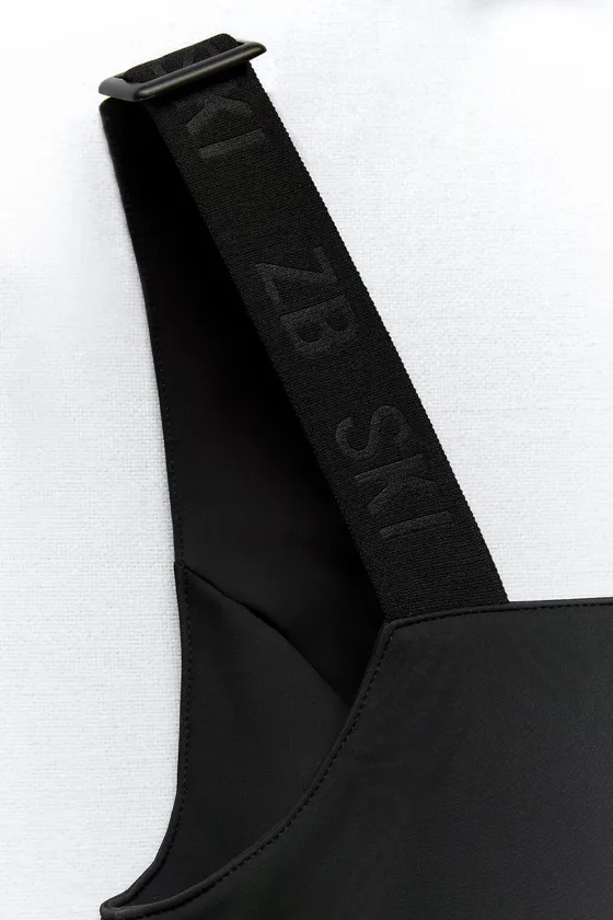 КОМБИНЕЗОН WATERPROOF RECCO® TECHNOLOGY FLARED — SKI COLLECTION