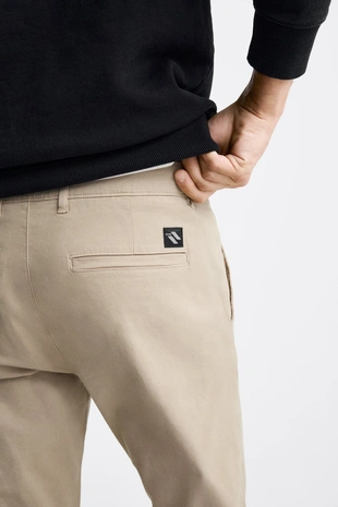 Брюки чинос из хлопка- Заказать в России