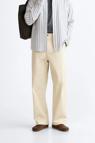 Брюки с защипами