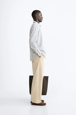 Брюки с защипами