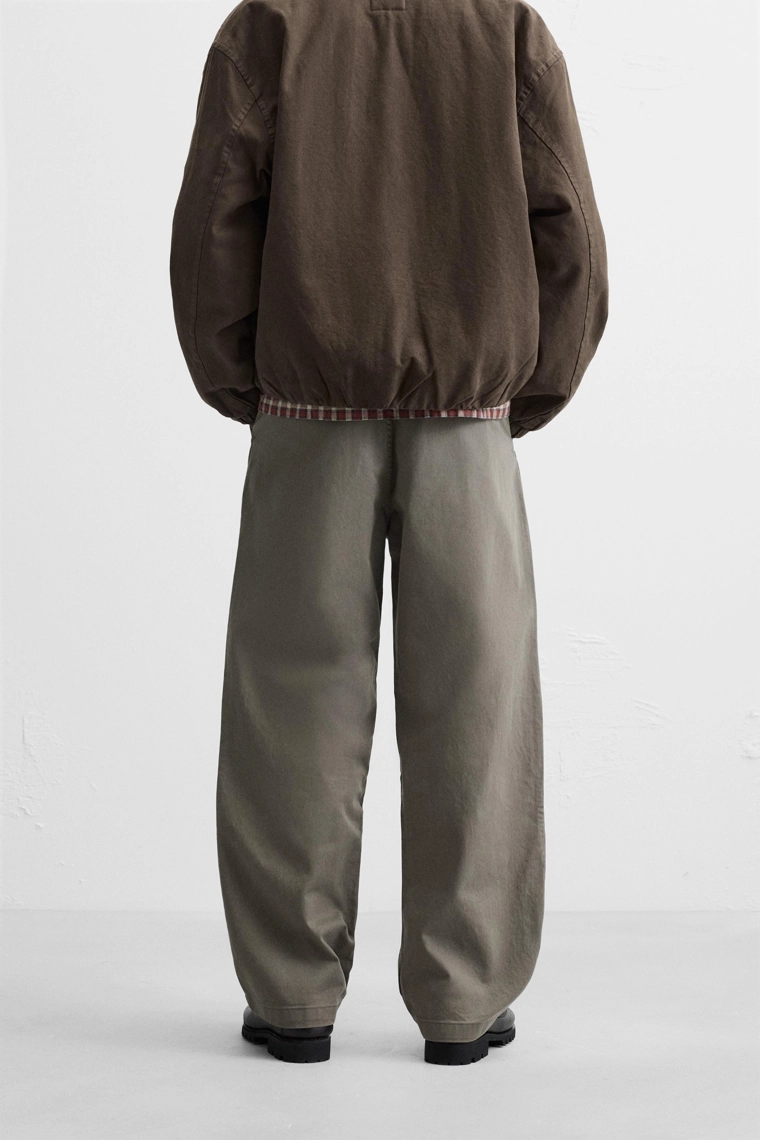 Брюки с объемным кроем chino