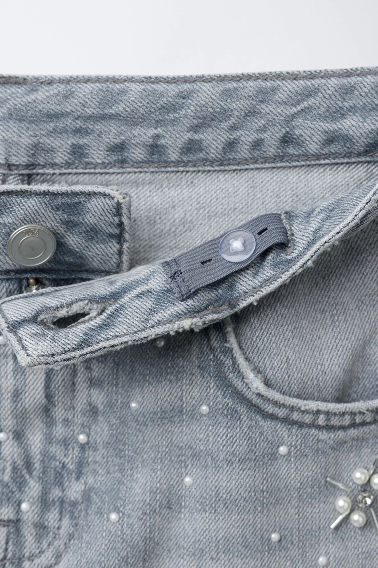 Широкие джинсы с поддельными жемчужинами