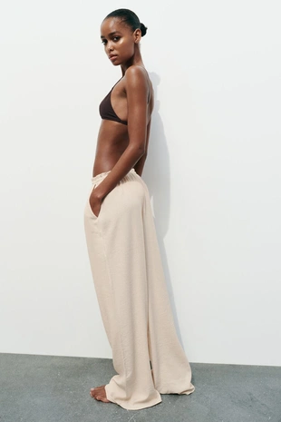 Брюки из ткани с рельефным узором- Заказать в России