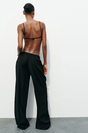 Брюки из ткани с рельефным узором- Заказать в России