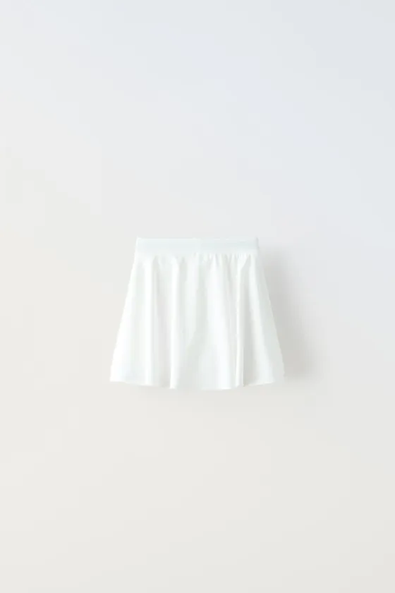 ЮБКА-ШОРТЫ ИЗ ВЫСОКОТЕХНОЛОГИЧНОЙ ТКАНИ С ОКАНТОВКОЙ