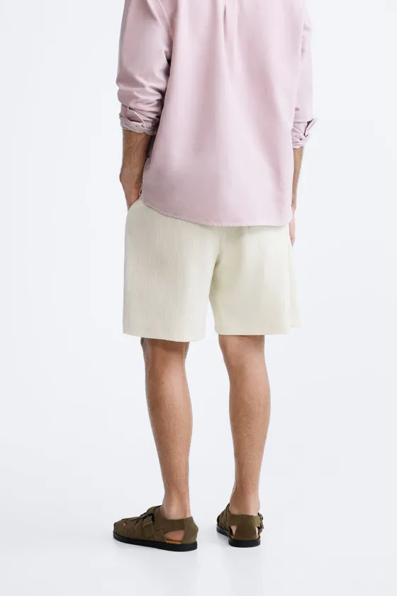 ШОРТЫ JACQUARD АСИММЕТРИЧНОГО КРОЯ