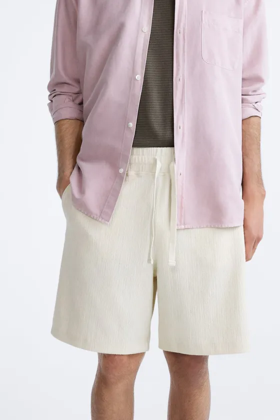 ШОРТЫ JACQUARD АСИММЕТРИЧНОГО КРОЯ