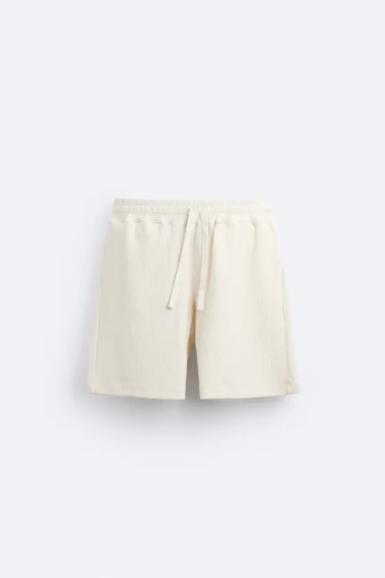 ШОРТЫ JACQUARD АСИММЕТРИЧНОГО КРОЯ