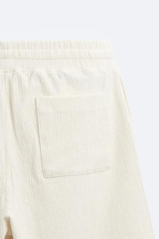 ШОРТЫ JACQUARD АСИММЕТРИЧНОГО КРОЯ