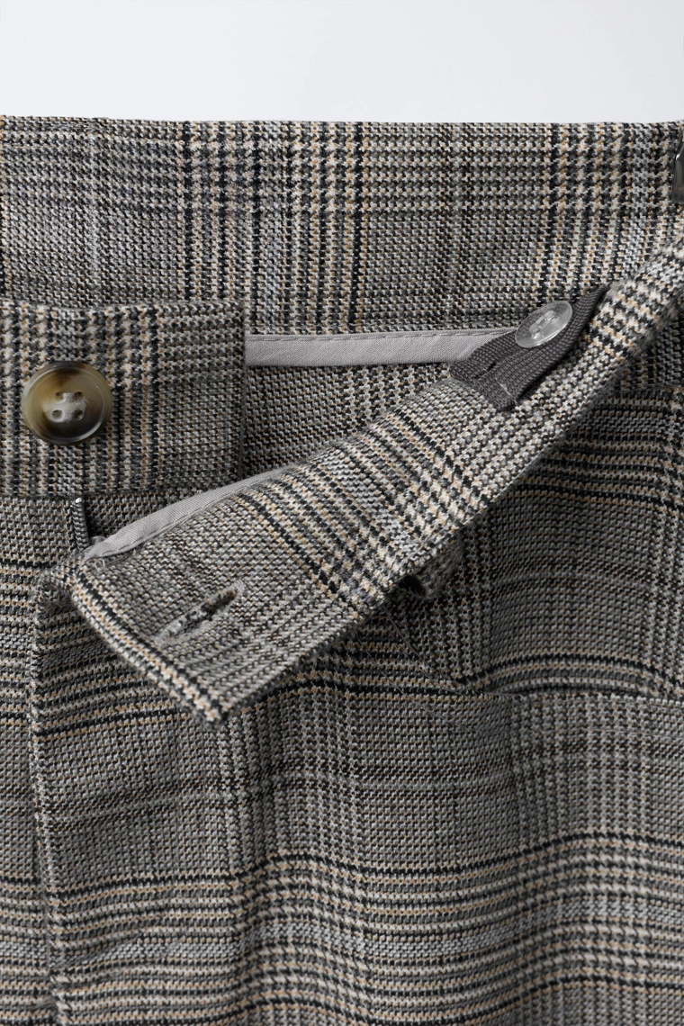 Теплые брюки-бочки в клетку