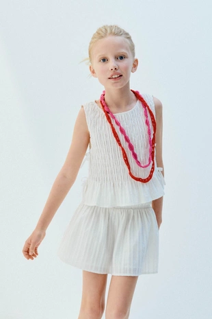 Топ с эластичной деталью и бантами- Заказать в России